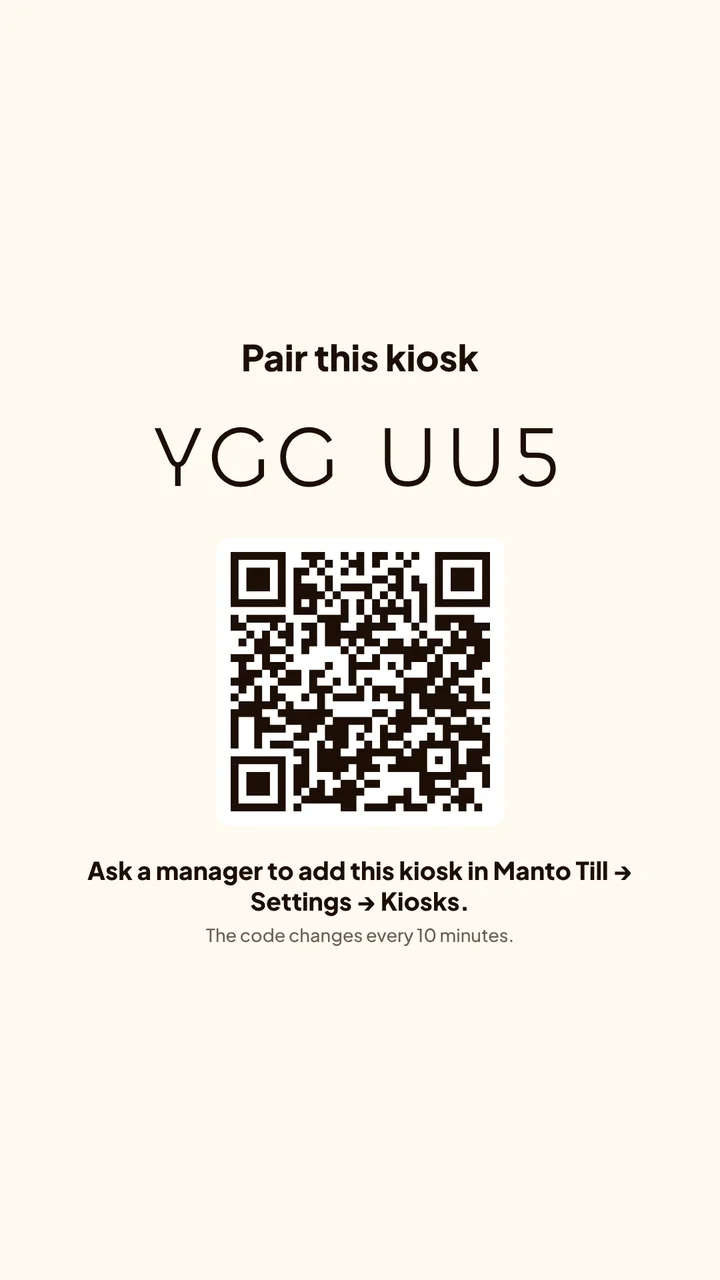 A new kiosk showing Pair this kiosk, a six-character code and a QR code